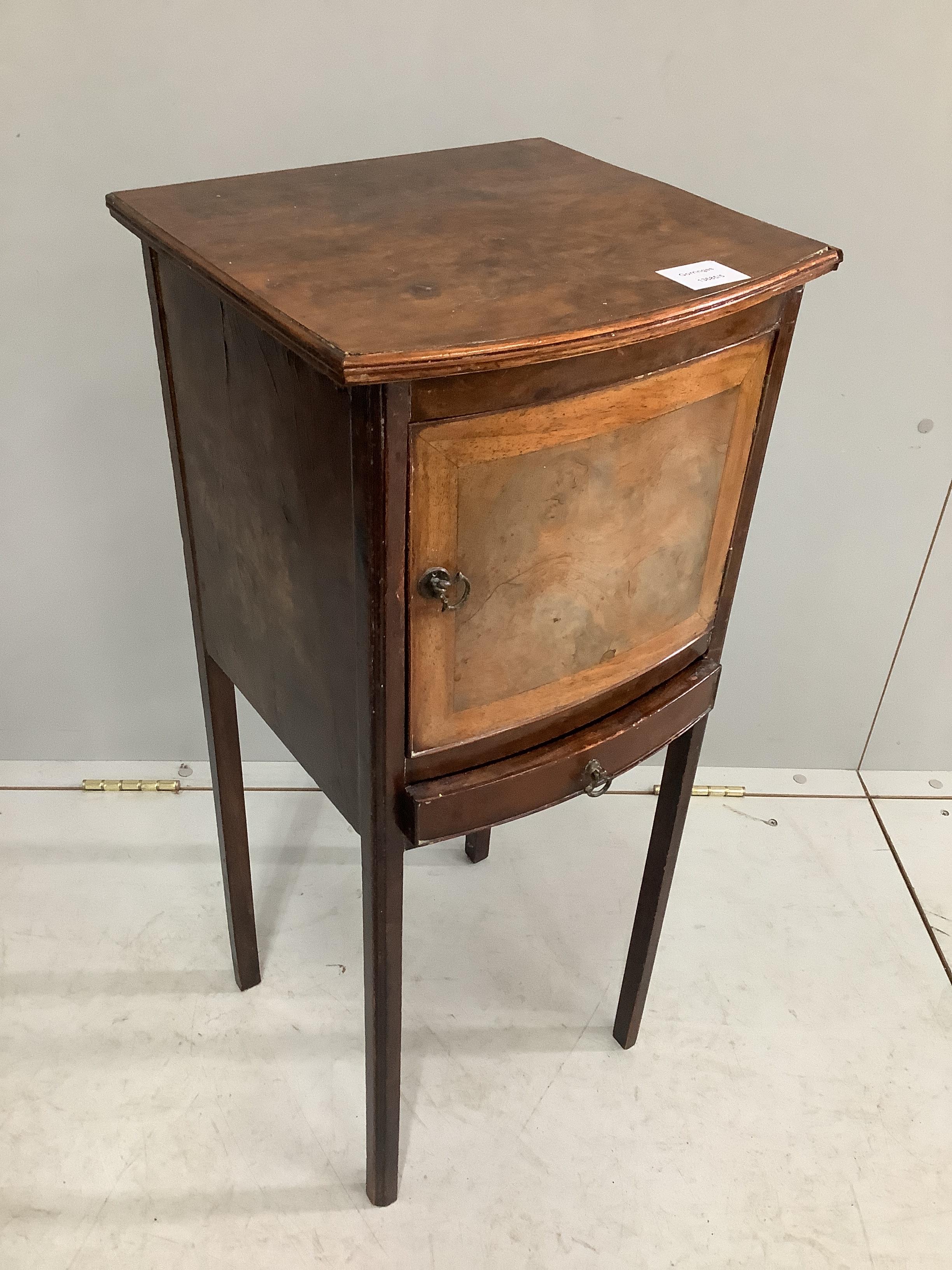 A George III style walnut bowfront bedside cabinet, width 32cm, depth 30cm, height 74cm